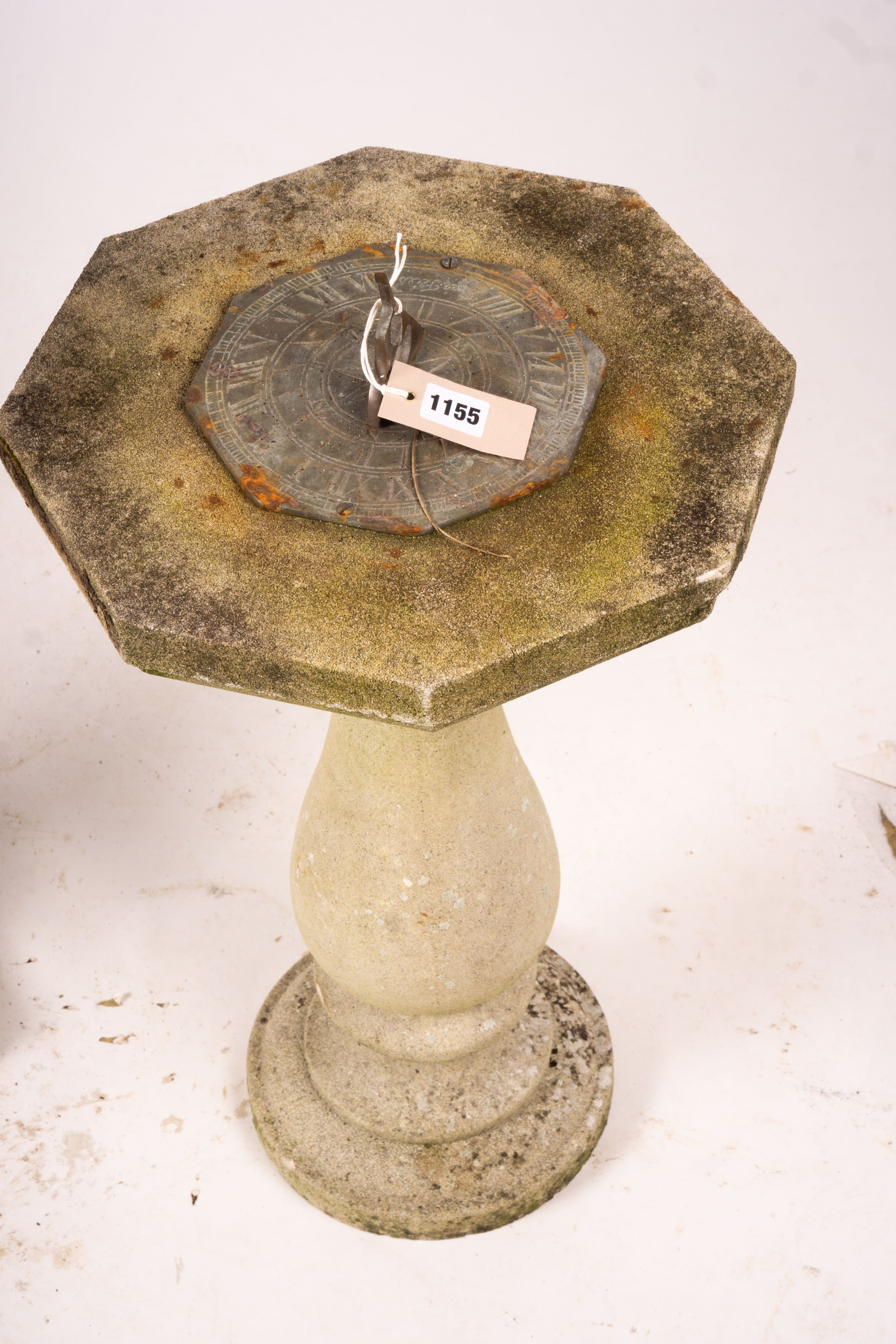 A reconstituted stone baluster pillar sundial and bird bath, tallest 72cm